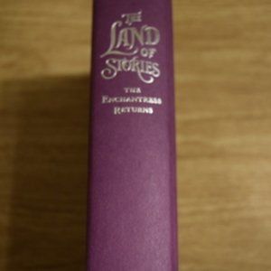 SIGNED copy of "Land of Stories" book.  Ideal for summer reading for teen.